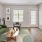 a living room with a green couch