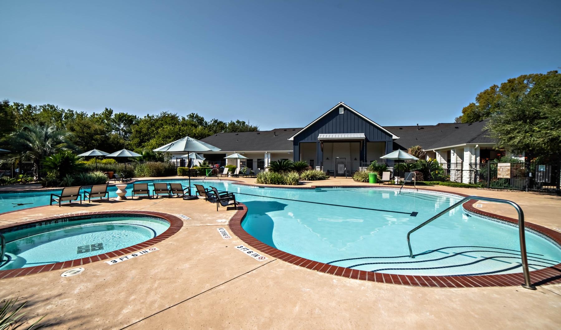 Find your perfect fit at Village at East Riverside a swimming pool in a backyard