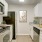 a kitchen with white cabinets