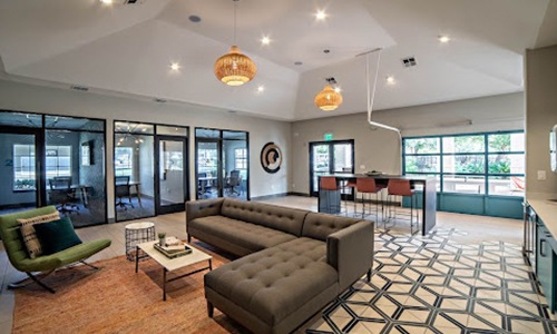 large room with couch and chair