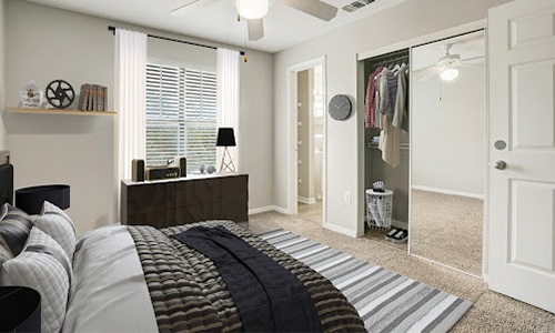 bedroom with bed and desk