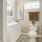 a bathroom with a toilet and sink