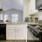 a kitchen with white cabinets
