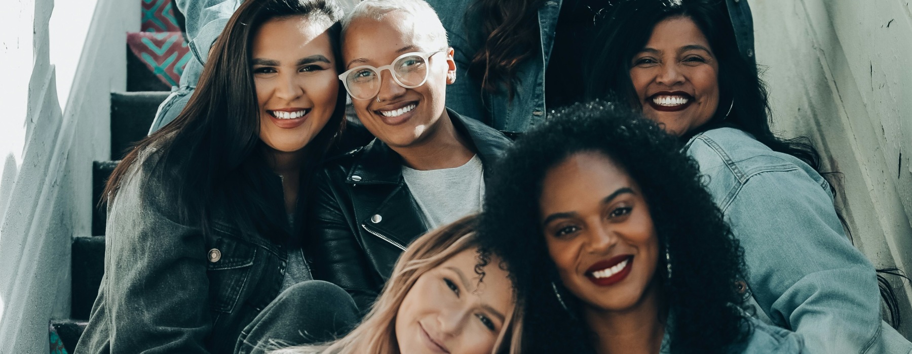 People smiling and sitting together